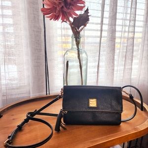 Dooney & Bourke Pebble Grain Folder over crossbody in Black with gold hardware